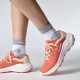 Salomon  Dámska bežecká obuv ALPHAGLIDE W emberglow/white/rouge red